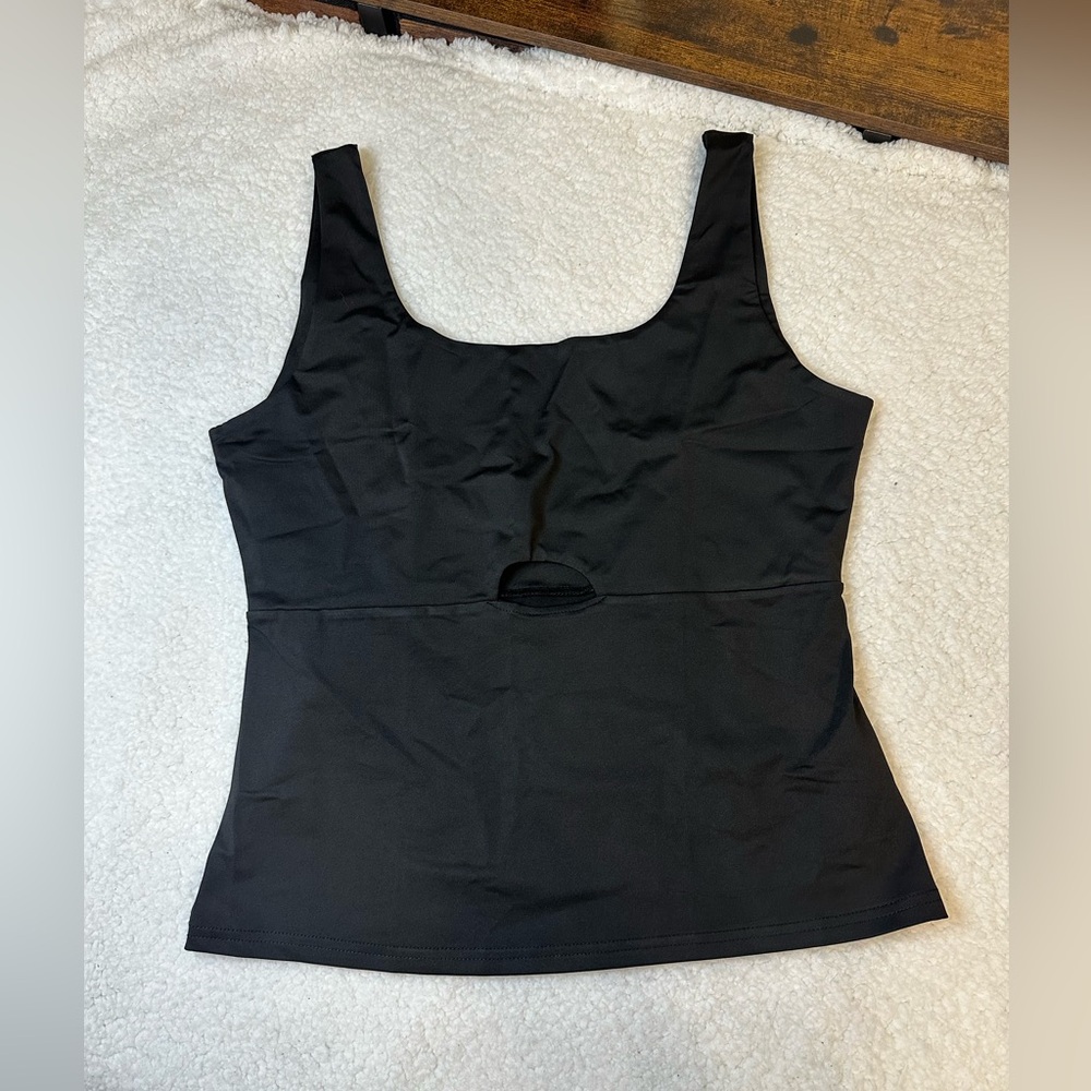 Black tank with key hole
